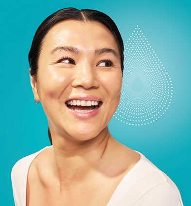 Headshot of SKINVIVE™ patient Anna smiling joyfully, with a glowing droplet in the background.